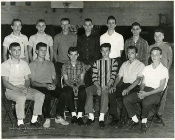 A group portrait of the Riverside Junior High School Mixed Chorus. Seated left to right are:  Eddie Taylor, John Hayes, Dave Allen, Eddie Cummings, Richard Robinson, and Joe Adams. Standing left to right are: Larry O'Conner, Buddy Mackley, Roger Hoover, Robert Hayhurst, Dave Kisner, Frank DeMasi, and David Erenrich. 