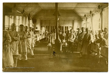 Postcard of interior of field hospital, German Red Cross Number 40, at Wavrin, France.  This was the hospital where Lt. Louis Bennett, Jr. passed away on August 24, 1918 while his wounds were being dressed after his plane was shot down.   Richard Lavril [sic] Ulffz is shown at center.  Postcard came with letter from Mlle. Madelien Dallenne to Sallie Maxwell Bennett, 14 July 1919. Bennett Collection Box 3, Folder 2.