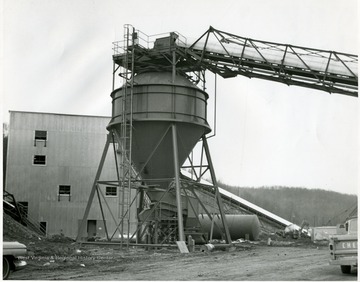 A conveyor belt runs to a coal shoot at the preparation plant, possibly Miracle Rune Mine.