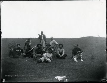 African-American baseball players of the Red Star team pose for a team photograph. They played for a community just down Dunloup Creek from Glen Jean. Trevey took this picture about 1915.