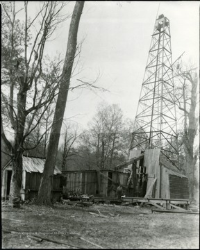 Oil well with building around it.