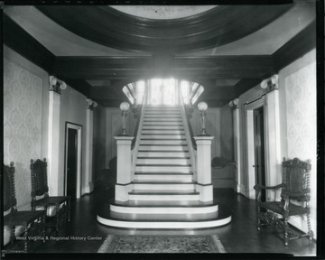 Interior view of the Bartlett Home in Grafton, W. Va., showing the main staircase.