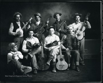 The Moatsville String Ticklers band pose with their instruments. None of the musicians are identified.