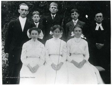 Subjects identified: The Reverend Benjamin Holtkamp, far left; The Reverend Ernest Preuss, far right; Minnie Betler; Ida Marti; Della Vogel; William Daetwyler; Frank Huppertz; Hugo Schleuniger;.