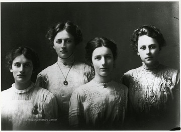 Left to right:  Mary Huber (b. 12/26/1891); Nell Daetwlyer (b. 7/2/1889); Ruth Farhner (b. 12/30/1891); Lena Haslebacher (b. 3/4/1890).  