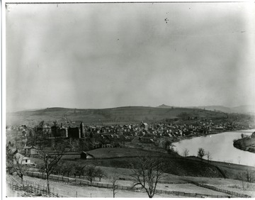 A view of Morgantown, West Virginia in 1895. West Virginia University and several houses can be seen near the Monongahela River; original Monongalia County Historical Society through Mrs. Mabel Stoyer.