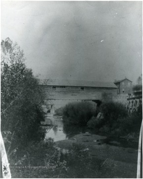 Close up view of the old 'Durbannah' Bridge spanning across Deckers Creek in Morgantown, W. Va. View of Deckers Creek running below bridge.