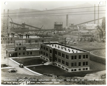 'Looking southeast at main office, service building and maintenance shops 2:00 p.m. Dec. 30, 1941.'