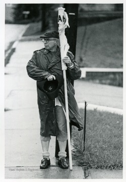 Man holding a flag.