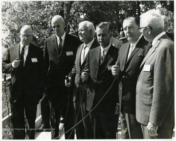 From left to right: Don Kammert, Bob McDonald, Harley Staggers, Gov. W. W. Barron, Jennings Randolph, unknown.