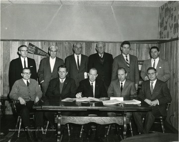Standing, left to right, Clifford Brown, Bradford Laidley, William A. Townes, Dean Paul Selbey, James R. McCartney.  Seated at far left is Glenn Thorne.