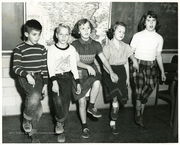 Left to right: Bobby Stone, Vaughn Kovach, Martha Woods, Virginia Wood, Margaret Curtis attending WVU elementary school.