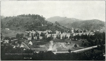 View of Weston State Hospital. This institution is located at Weston in Lewis county, and is reached by the Baltimore and Ohio Railroad, and by the inter-urban line of the Monongahela Valley Traction Company. C. E. White, Superintendent. Number of patients, July 1, 1920... 1,098.