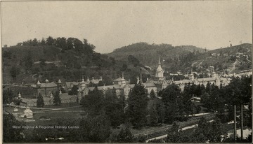An aerial view of Weston State Hospital. 'This institution is located at Weston in Lewis county, and is reached by the Baltimore and Ohio Railroad, and by the inter-urban line of the Monongahela Valley Traction Company. C. E. White, Superintendent. Number of patients, July 1, 1919... 1,107.