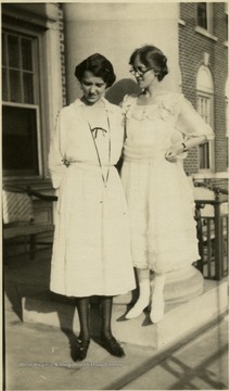 A photograph of Dr. Margaret B. Ballard and a friend standing outside.