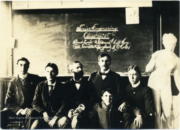 Senior Engineering students posed in classroom.  From left to right:  Harry Cole, Bert Lawhead, Elmer Leach, Bill Bruner, Fred Davis, and Charles McCoy.