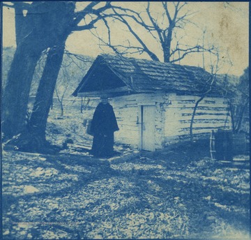 Known as the Kennedy Farm, John Brown rented the homestead using the name "Issac Smith", in the summer of 1859. Located across the Potomac River from Virginia, it was here Brown finalized his plans to raid the United States Armory at Harpers Ferry. The woman in the photograph is not identified.