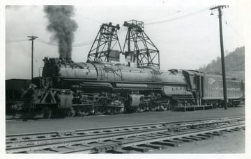 A picture of series 1201-1212, type 4-6-6-4, class M-2 locomotive engine on Western Maryland Railway at Ridgeley, W. Va.  The engine is built by Baldwin Locomotive Works (no. 62463)in 1940 with following specification: wt--601,000lb; cyl.-4-23x32; dri. 69"; T.F. 95,500 lb.; B.P. 250lb.  