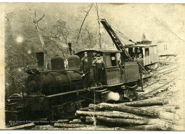 'R. Chafey, owner. Pete Chanel was the engineer on this log train'.