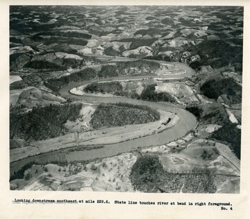'Looking downstream southeast at mile 229.6.  State line touches river at bend in right foreground.'