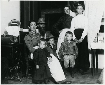 Patrick Gainer in the center wearing hat.