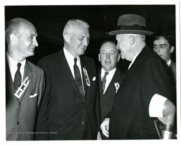 From left to right: Senator John D. Hoblitzell, Jr., Senator Chapman Revercomb, Unknown, President Dwight D. Eisenhower and governor Cecil Underwood.