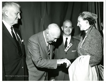 From left to right: Senator Chapman Revercomb, President Dwight Eisenhower, Senator John D. Hoblitzell, Jr. and Unknown.