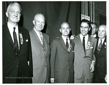 From left to right: Senator Chapman Revercomb, President Dwight Eisenhower, Senator John D. Hoblitzell, Jr. and Governor Cecil Underwood.