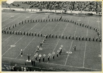 WVU Marching Band performing halftime field show.