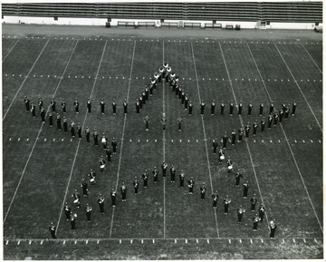 WVU Marching Band performing halftime field show. In star formation at the WVU-Syracuse game.