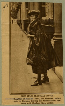 Daughter of John W. Davis, the American Ambassador to England, leaving the Ambassadorial Residence at 29 Chesham Place, London.