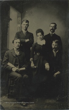 Group portrait of Braxton Davenport Gibson (sitting, left) of Charles Town, West Virginia with three men and a woman.