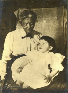 Grandmother, Mrs. John Thomas Gibson holding infant granddaughter, Frances Davenport Packette