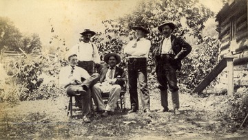 Only identified man is Herbert S. Thomas Sr., seated on the right.