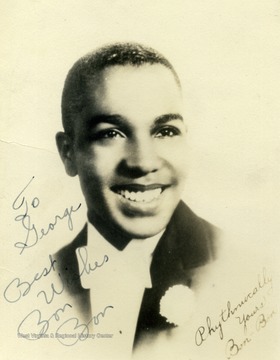 Bon Bon played at the Stanley in Pittsburgh. He was a vocalist with Jan Savitt, who he left in October of 1940 to create his own orchestra. The photo was collected by George and Mike Barrick, two WVU students. The photo is inscribed with "To George Best Wishes Bon Bon" 