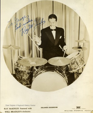 This photo was collected by George and Mike Barrick, two WVU students. He performed at The Met. in Morgantown as part of Will Bradley's orchestra. The photo is signed "To George Best Wishes Ray McKinley"