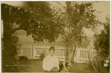 Photograph taken at Ada' s "Old home", before her marriage to Gene Ford. Ada was a West Virginia state leader in the Women's Suffrage Movement to ratify the 19th Amendment to the United States Constitution, giving the women the right to vote. Mrs. Ford was also president and founder of the Women's Suffrage League in Taylor County.