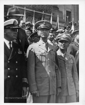 Center: US Army General Jonathan M. Wainwright, Commander of Allied Forces in the Philippines at the time of their surrender to Japan in 1942.  Wainwright was a POW, held by the Japanese until his liberation in August 1945.