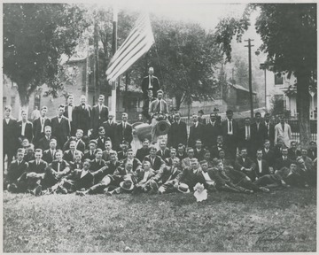A group of unidentified men pose beside the newly acquired Civil War cannon. This ancient piece of artillery is claimed to weight 16,500 pounds and was used by the southern states. The cannon was transported from the state of Florida, specifically. Former Congressman Littlepage donated the item to the city. 