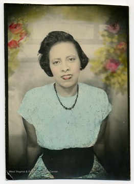 Hand colorized portrait of Victorine Louistall-Monroe.Victorine was the first African-American woman to earn a degree from West Virginia University in 1964.